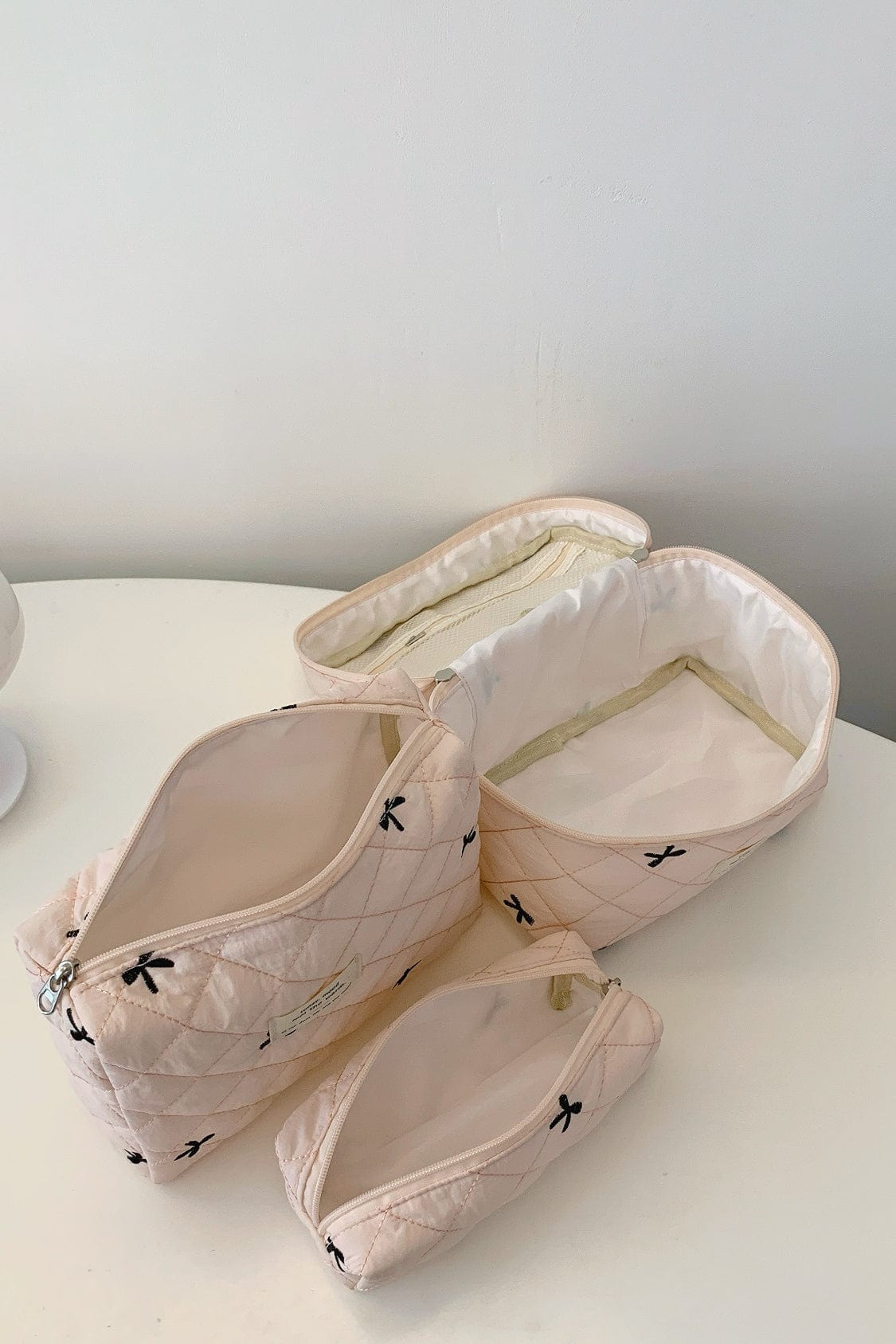 3 Piece Bow Quilted Cloth Storage Bag Set - Trendsi