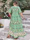 Plus Size Floral Tie Neck Flutter Sleeve Maxi Dress - Trendsi