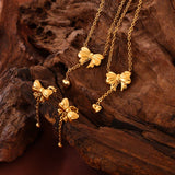 Titanium Steel Bow Earrings - Trendsi - Flyclothing LLC