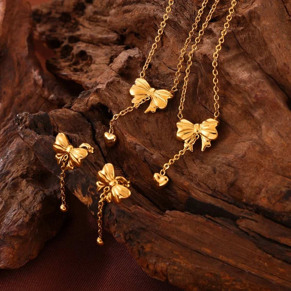 Titanium Steel Bow Earrings - Trendsi - Flyclothing LLC