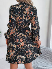 Pleated Printed Tie Neck Long Sleeve Dress - Trendsi