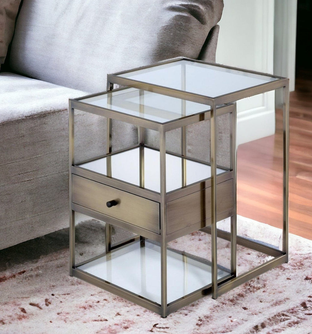 Set of Two 26" Brass And Clear Glass And Iron End Table With Drawer And Two Shelves With Magazine Holder - Homeroots