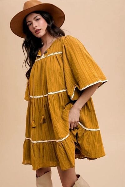 Annie Wear Tassel Contrast Trim Tie Neck Half Sleeve Tiered Dress - Trendsi