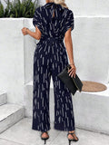 Tied Printed Mock Neck Wide Leg Jumpsuit - Trendsi