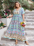 Plus Size Printed Tie Neck Flutter Sleeve Maxi Dress - Trendsi