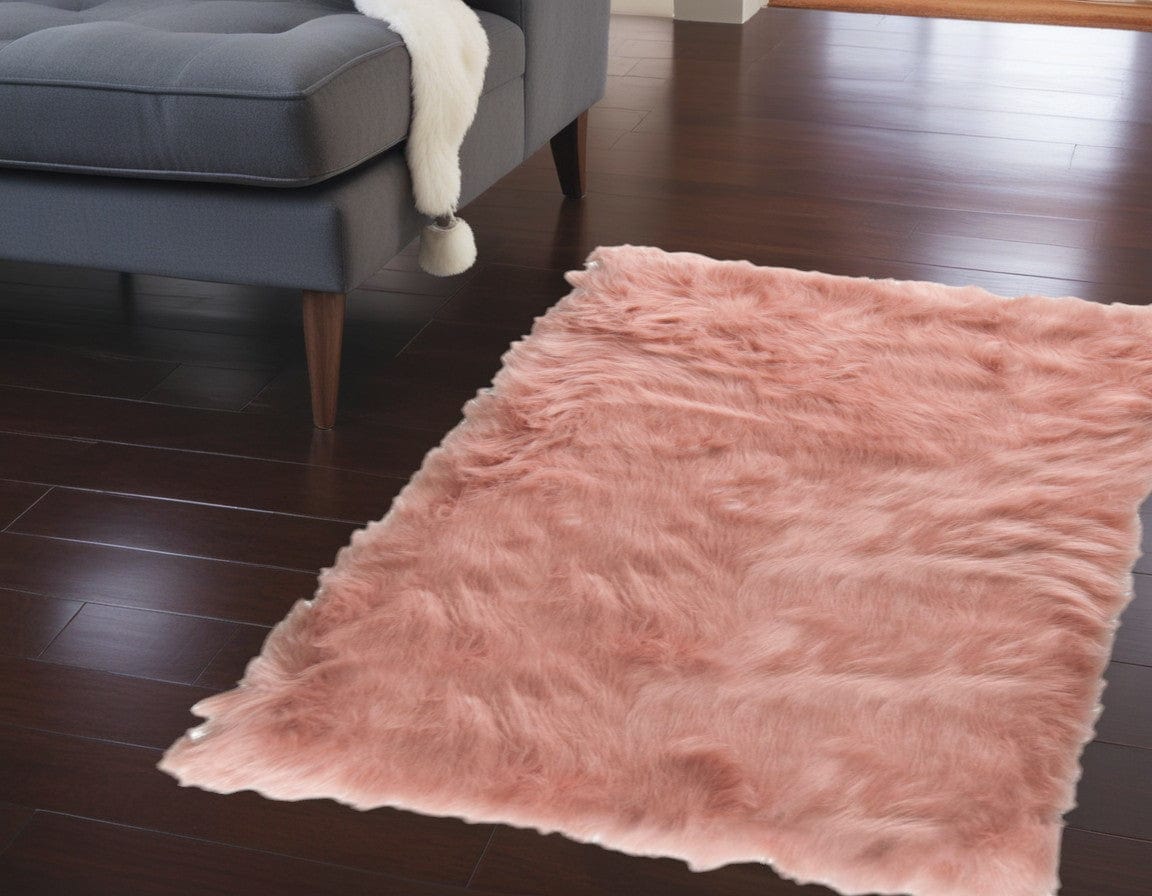 24" X 36" X 1.5" Dusty Rose Plush Faux Sheepskin Area Rug - Homeroots - Flyclothing LLC