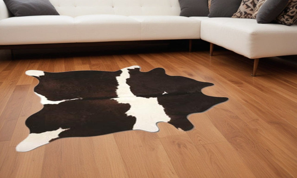 60" X 84" Chocolate And White Cowhide - Area Rug - Homeroots