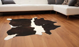 60" X 84" Chocolate And White Cowhide - Area Rug - Homeroots