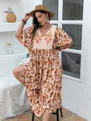 Plus Size Printed Tie Neck Half Sleeve Midi Dress - Trendsi