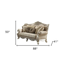 88" Champagne Velvet Curved Floral Sofa And Toss Pillows