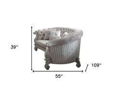 55" Ivory Velvet Curved Floral Sofa And Toss Pillows With Gray Legs