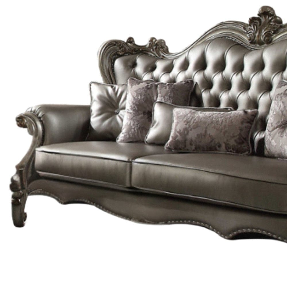 46" Platinum Faux Leather Curved Sofa And Toss Pillows - Homeroots