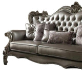 46" Platinum Faux Leather Curved Sofa And Toss Pillows - Homeroots