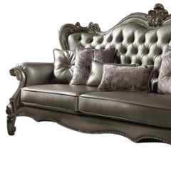 46" Platinum Faux Leather Curved Sofa And Toss Pillows - Homeroots