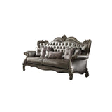 46" Platinum Faux Leather Curved Sofa And Toss Pillows - Homeroots