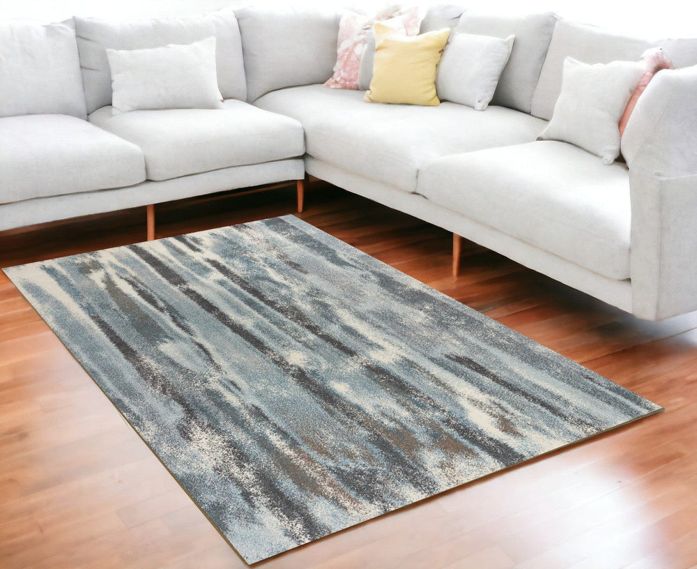 5' X 8' Teal Abstract Brushstrokes Indoor Area Rug - Homeroots