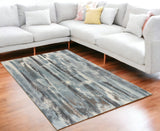 5' X 8' Teal Abstract Brushstrokes Indoor Area Rug - Homeroots