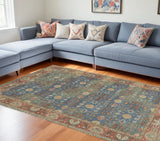 7' X 9' Blue and Red Floral Medallion Hand Woven Area Rug - Homeroots