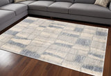 7' X 9' Ivory and Blue Area Rug - Homeroots