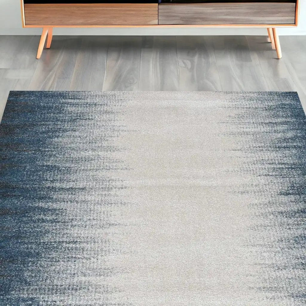 5' X 8' Ivory Or Blue Gradient Bordered Indoor Area Rug - Homeroots