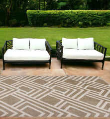 7' X 10' Beige and Ivory Geometric Indoor Outdoor Area Rug