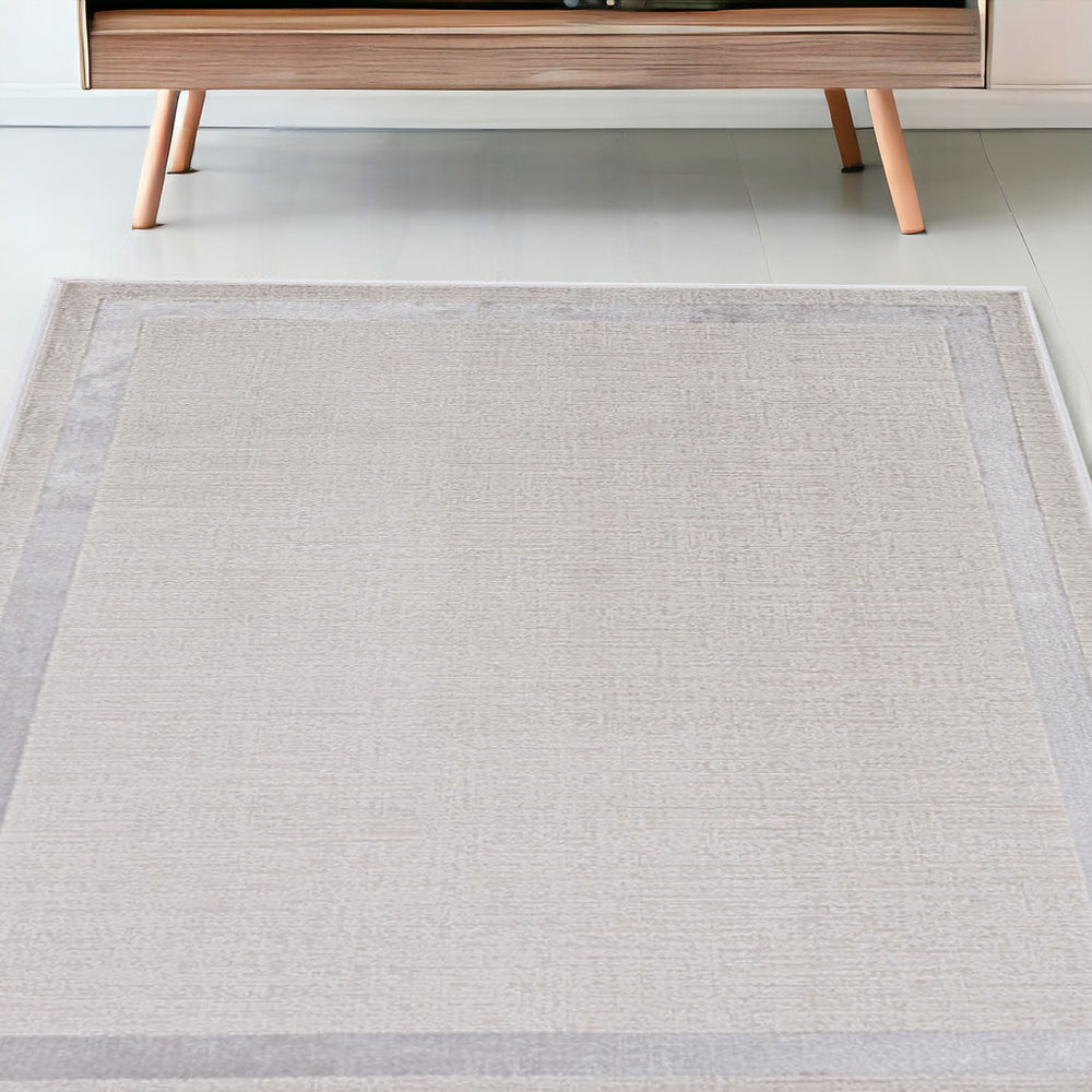 5' X 8' Ivory Silver Machine Woven Bordered Indoor Area Rug - Homeroots