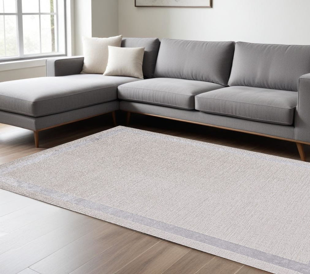 7' X 10' Ivory Silver Machine Woven Bordered Indoor Area Rug - Homeroots