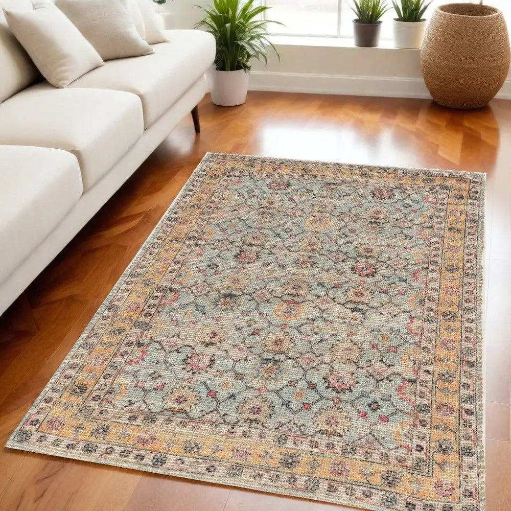 5' X 7' Green and Ivory Floral Hand Woven Area Rug - Homeroots