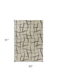5' X 7' Ivory Machine Woven Abstract Indoor Shag Rug - Homeroots