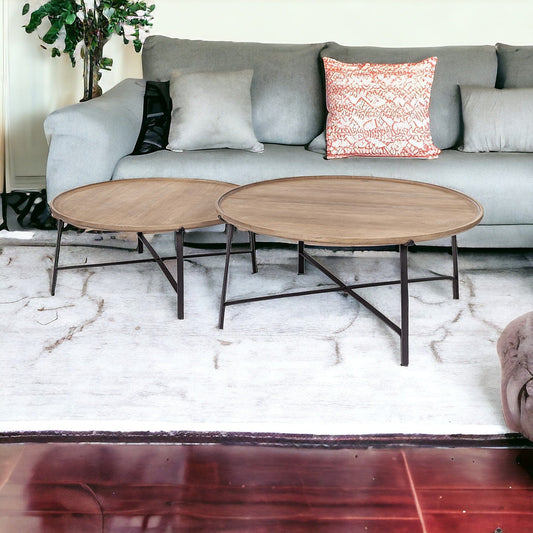 Set of Two 41" Brown And Black Solid Wood And Iron Round Nested Coffee Tables - Homeroots