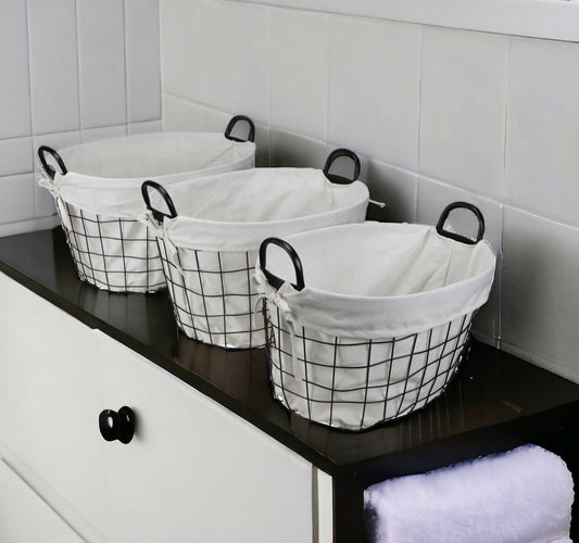Set Of Three Black Oval Wire Baskets with White Fabric Liners and Handles - Homeroots