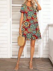 Pocketed Printed Round Neck Short Sleeve Mini Dress - Trendsi
