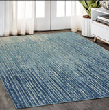 5' X 7' Ivory And Blue Abstract Stripes Power Loom Area Rug - Homeroots