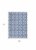 4' X 6' Blue And Ivory Geometric Dhurrie Area Rug - Homeroots