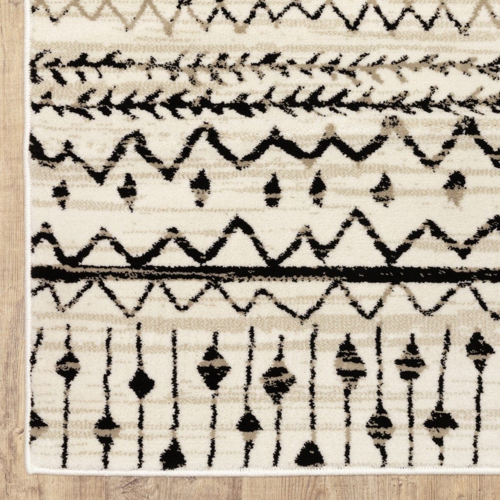 2' X 8' Ivory And Black Eclectic Patterns Indoor Runner Rug