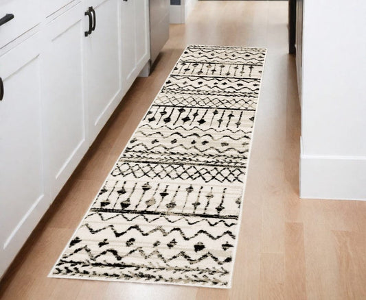 2' X 8' Ivory And Black Eclectic Patterns Indoor Runner Rug