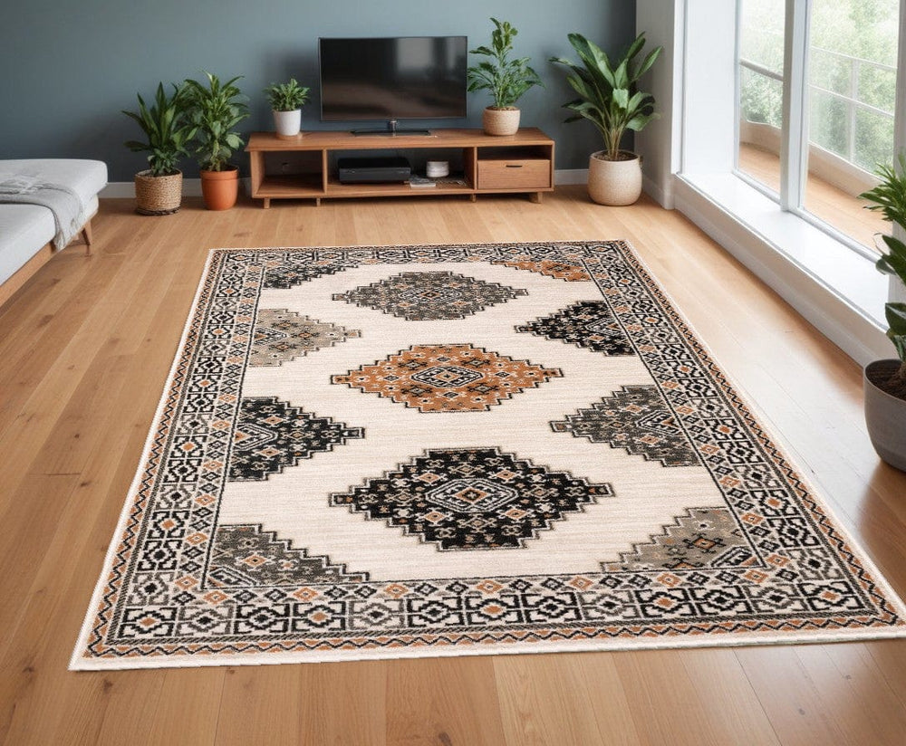 4' X 6' Abstract Ivory And Gray Geometric Indoor Area Rug