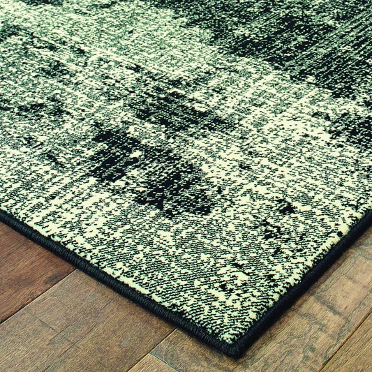 9' X 12' Black Ivory Machine Woven Abstract Indoor Area Rug