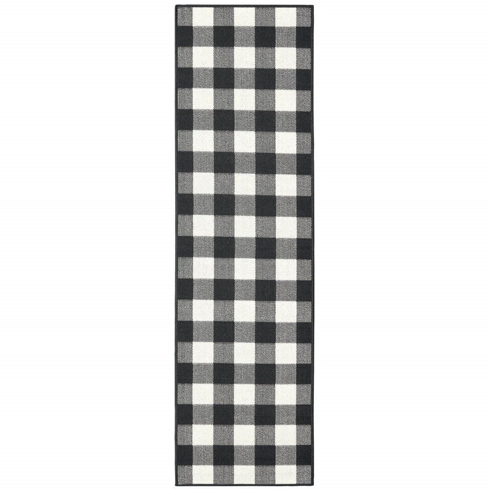 2' X 8' Black and Ivory Indoor Outdoor Area Rug