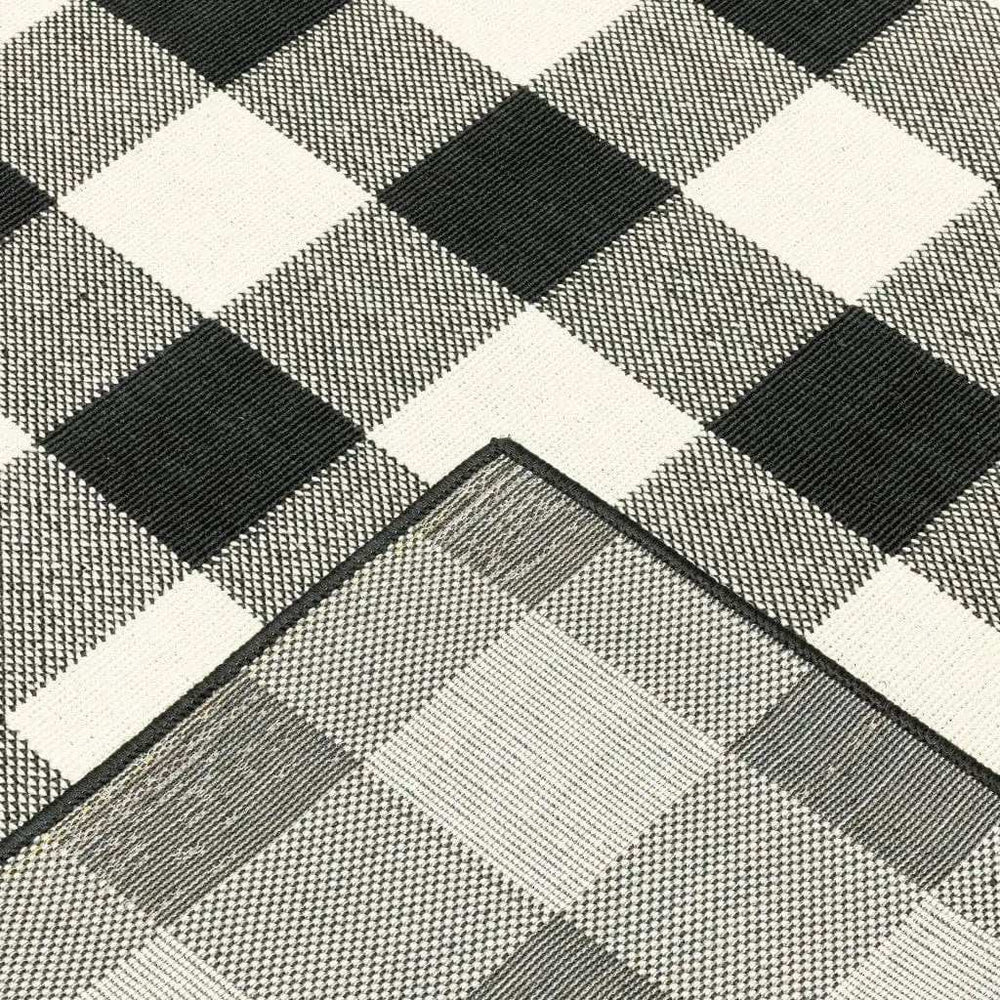 5' X 8' Black and Ivory Indoor Outdoor Area Rug - Homeroots - Flyclothing LLC