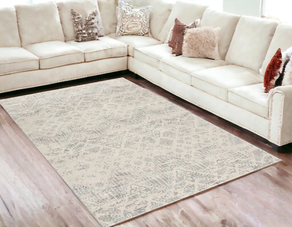 5' X 8' Ivory Distressed Ikat Pattern Area Rug - Homeroots