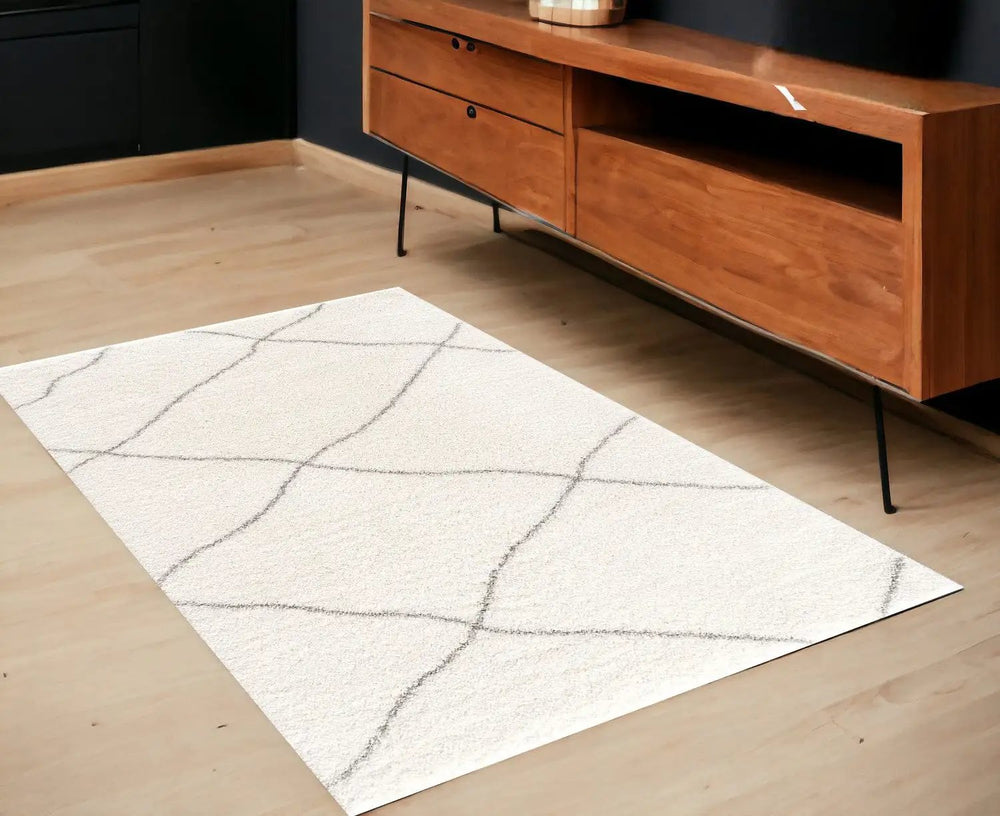 4' X 6' Ivory Modern Uneven Lattice Area Rug - Homeroots