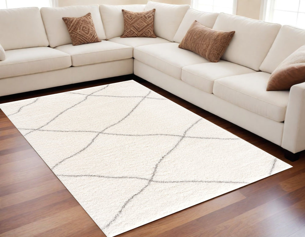 5' X 8' Ivory Modern Uneven Lattice Area Rug