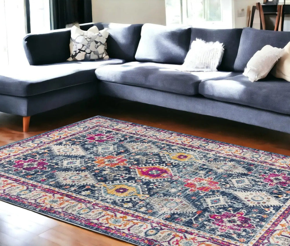 6' X 9' Blue and Ivory Oriental Area Rug - Homeroots