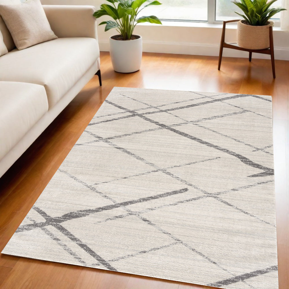 5' X 7' Gray and Ivory Geometric Area Rug