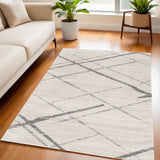 5' X 7' Gray and Ivory Geometric Area Rug