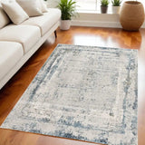 5' X 7' Blue and Ivory Abstract Area Rug - Homeroots