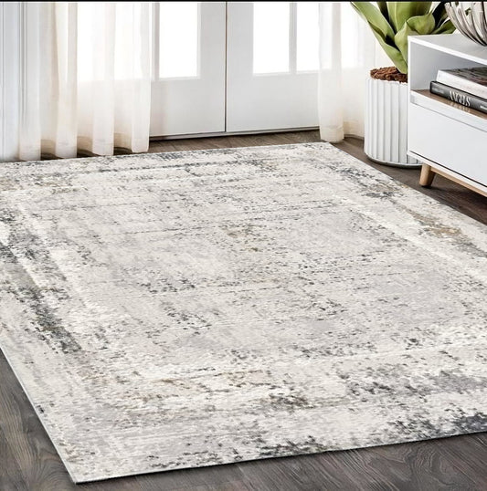 5' X 8' Gray and Ivory Abstract Power Loom Area Rug