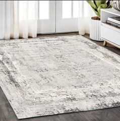 5' X 8' Gray and Ivory Abstract Power Loom Area Rug