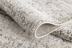 5' X 7' Gray and Ivory Abstract Area Rug